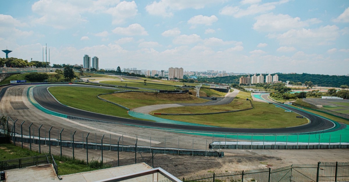 View over the Interlagos race circuit in Sao Paulo with apartment towers behind it